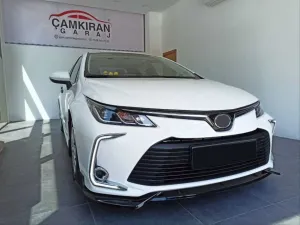 Toyota Corolla 2018-Günümüz (E210) uyumlu 2019+ Ön Lıp modelleri Oto Aksesuar Shop'de. Kaliteli malzeme, hızlı kargo ve güvenli alışverişle hemen inceleyin.