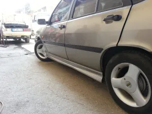 Fiat Tempra 1990-1999 (Type 159) uyumlu Yan Marşpiyel Benekli Model Marşpiyel Boyalı (Yazısız) modelleri Oto Aksesuar Shop'de. Kaliteli malzeme, hızlı kargo ve